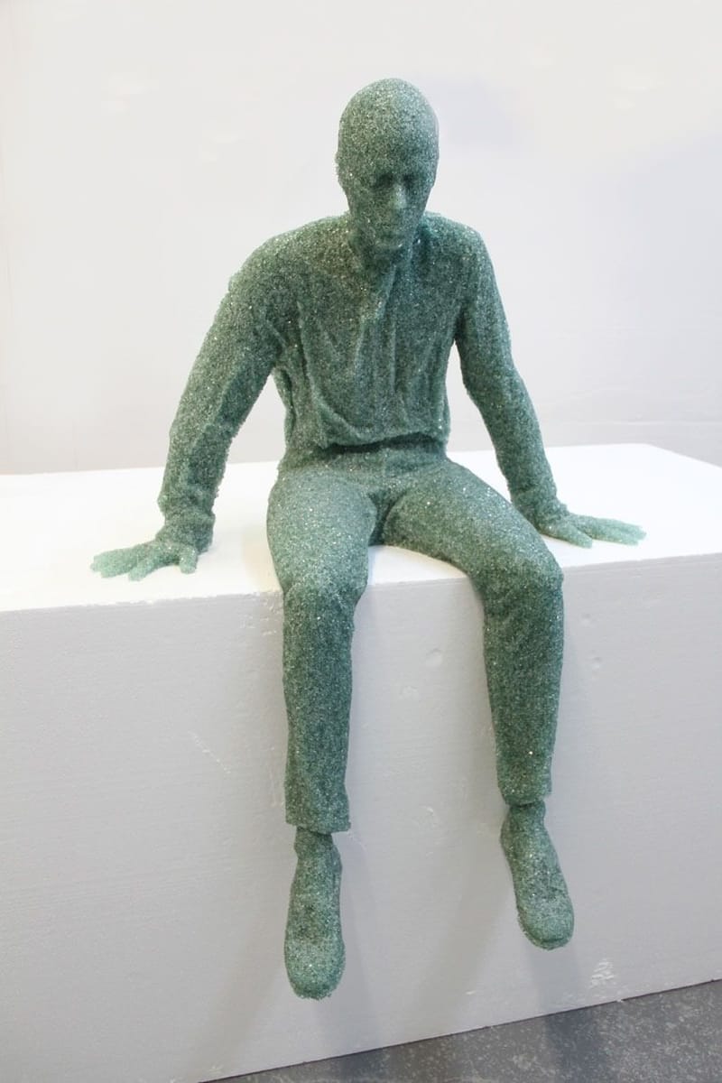 Artwork Title: Seated Glass Figure