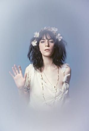 Artwork Title: Patti Smith White Dress on Blue Hand Up