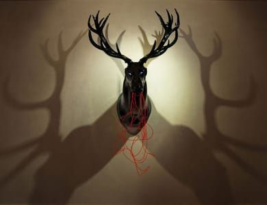Artwork Title: Glory, rigid foam form, eL wire, red deer antlers, gloss black finish, 35.5