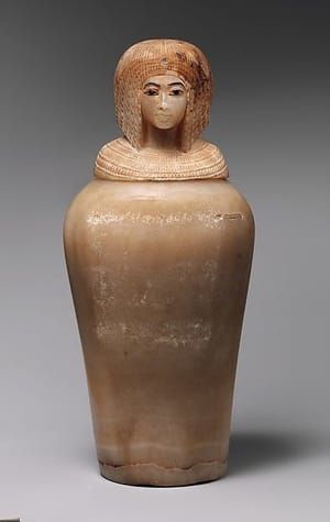 Artwork Title: Canopic Jar  with Lid in the Shape of a Royal Woman's Head
