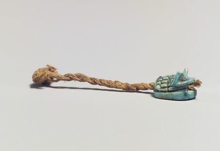 Artwork Title: Hedgehog Amulet on a string, 13th Dynasty
