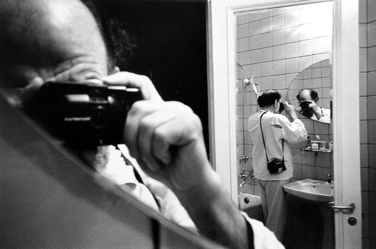 Artwork Title: Self-portrait, Vinius, Lithuania Hotel Room John Mirrors,  First Night in Soviet Union, Photo by All