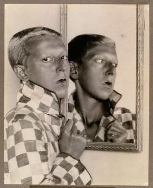 Artwork Title: Self-portrait (reflected image in mirror with chequered jacket)
