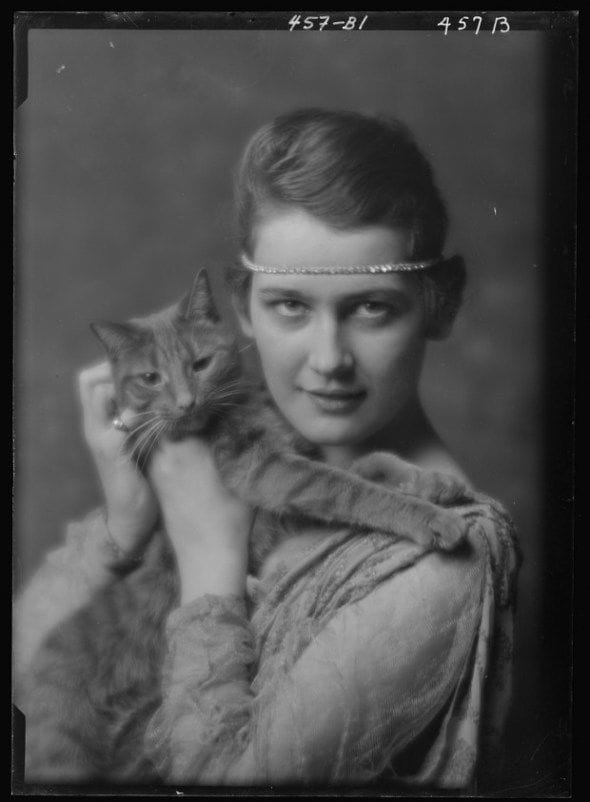Artwork Title: Unknown Woman with Buzzer the Cat