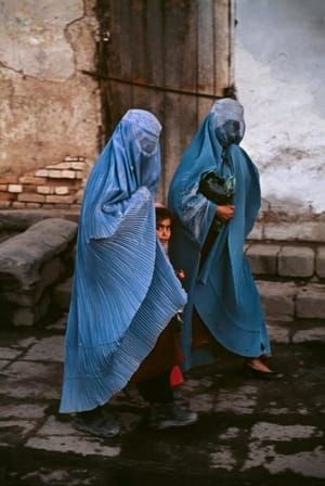 Artwork Title: Girl between two woman in Bazaar
