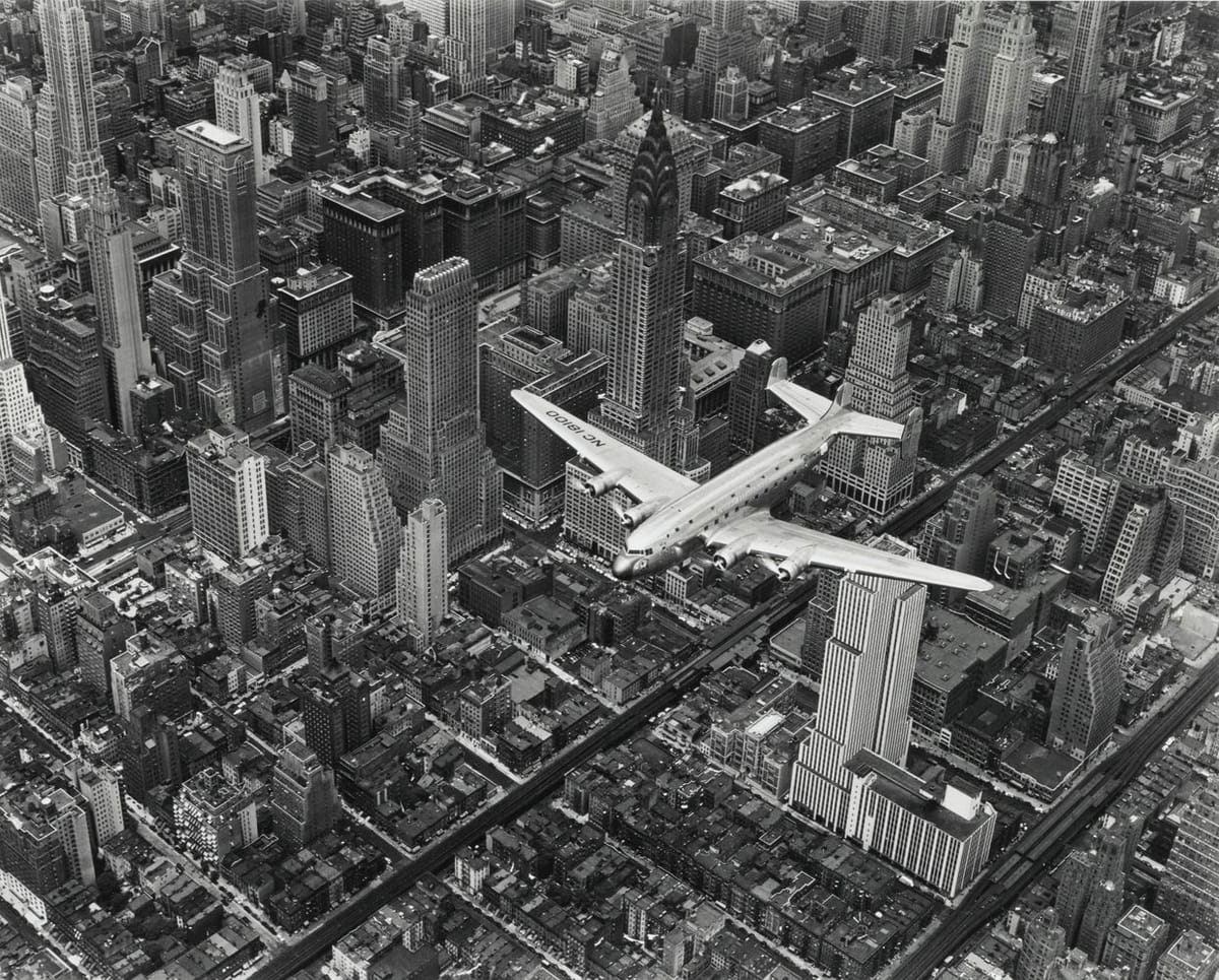 Artwork Title: 'a Dc-4 Flying Over New York City'