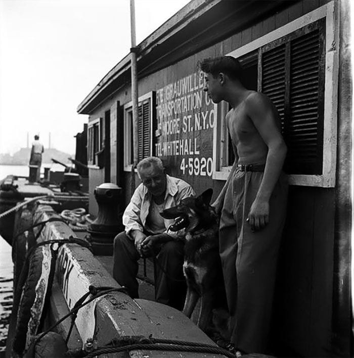 Artwork Title: Men With German Shepherd On A Dock
