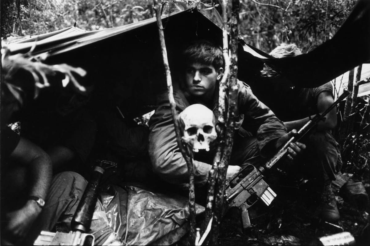 Artwork Title: Soldiers encamped in the Vietnamese jungle during the Vietnam War