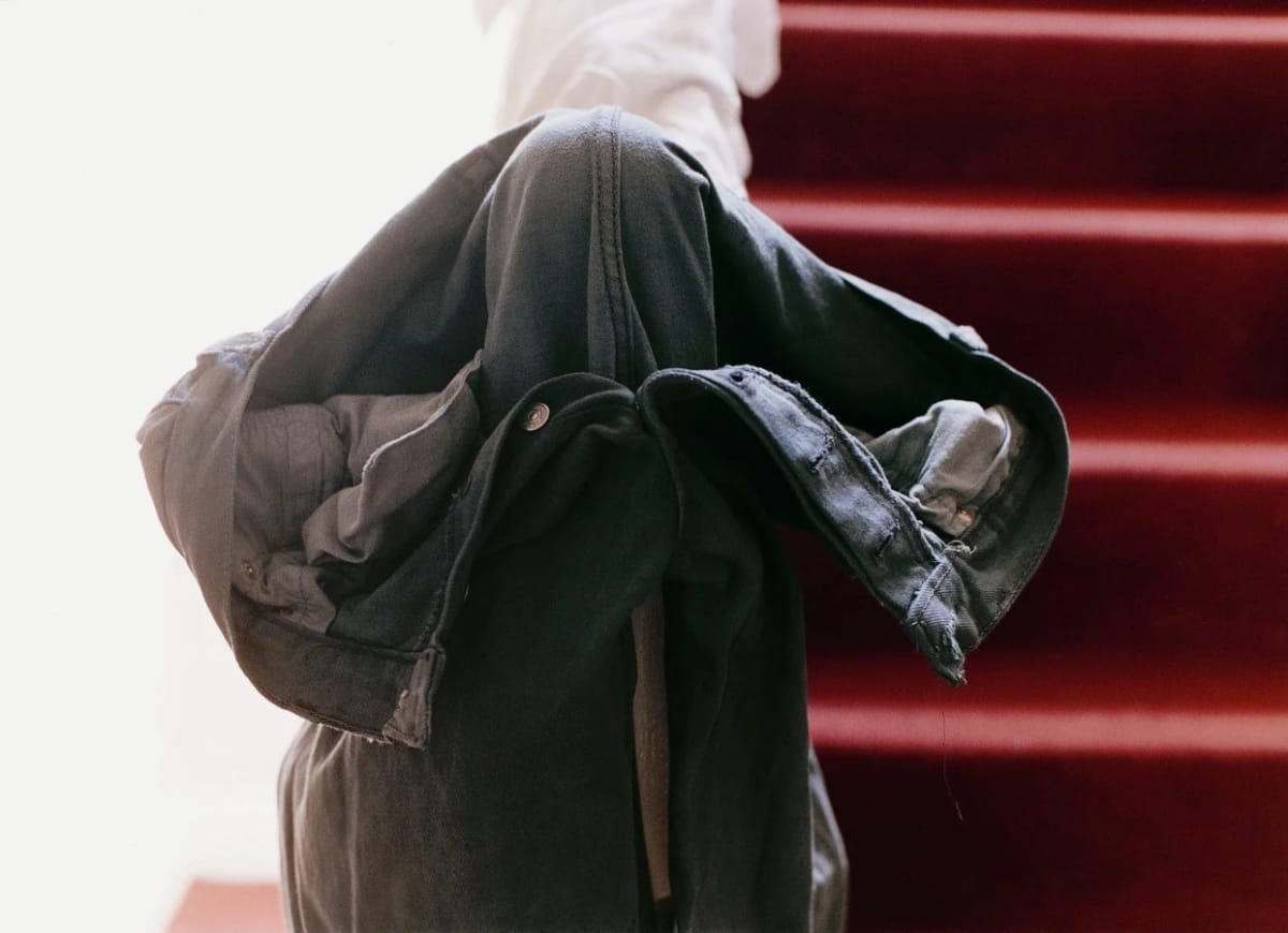Artwork Title: Grey jeans over stair