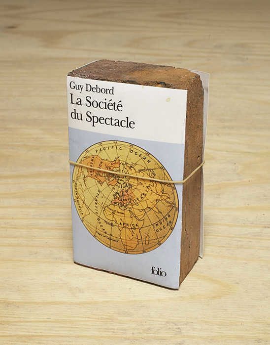 Artwork Title: La societe du spectacle brickbat