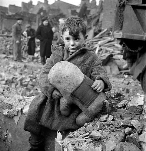 Artwork Title: An abandoned boy, holding a soft toy amongst the devastation of the London Blitz