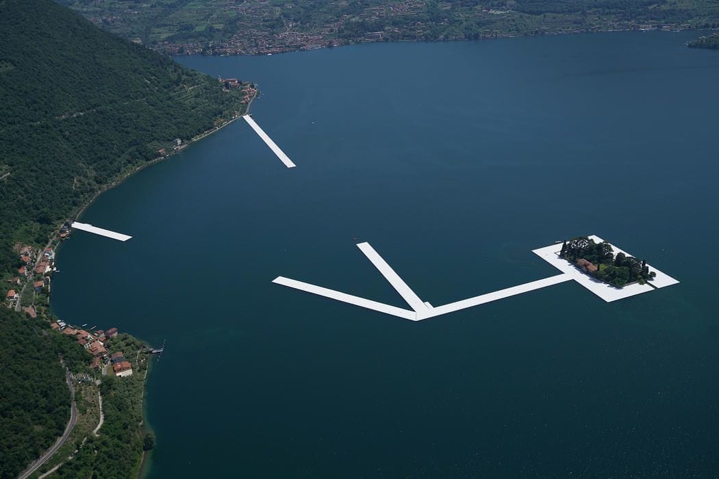 Artwork Title: One by one, workers install the 100 by 16 meter sections to connect the island of San Paolo with the