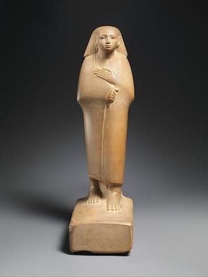 Artwork Title: Statuette of a Cloaked Man BC