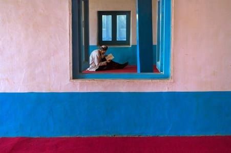 Artwork Title: Man reads at Mosque