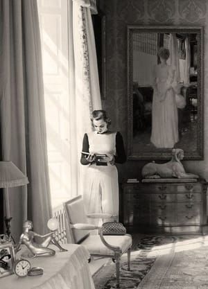 Artwork Title: Woman reads with artwork