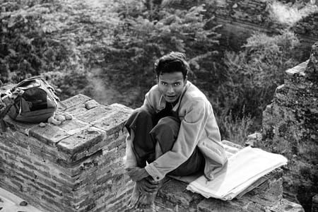 Artwork Title: An art seller at one of the multiple pagodas in Nyaung-U waiting for tourists